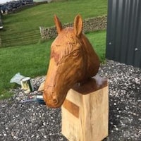 a horse head carved out of wood